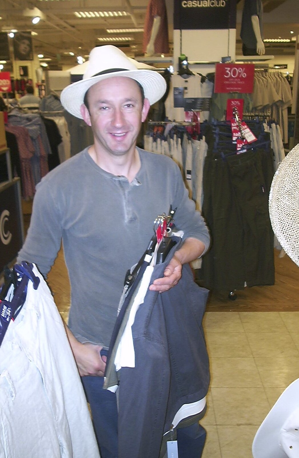 DH has found a hat from Longview at the Waterfront, and a Trip to the Shops, Norwich, Norfolk - 27th June 2004