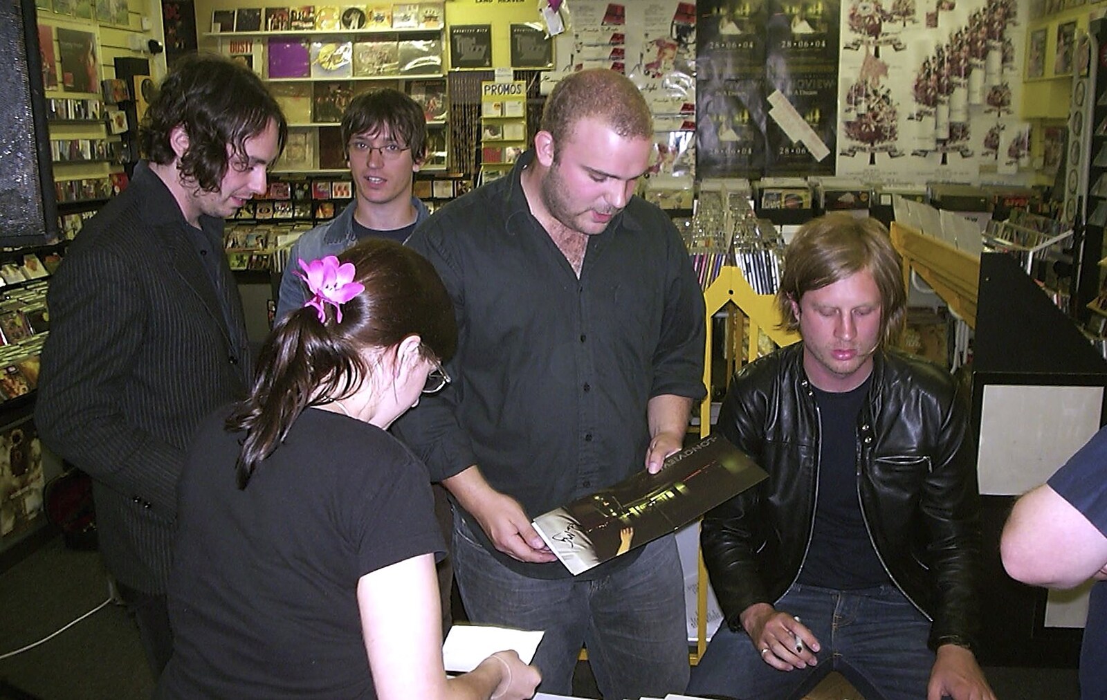 Some more CD signing occurs from Longview play Revolution Records, Diss, Norfolk - 2nd July 2004