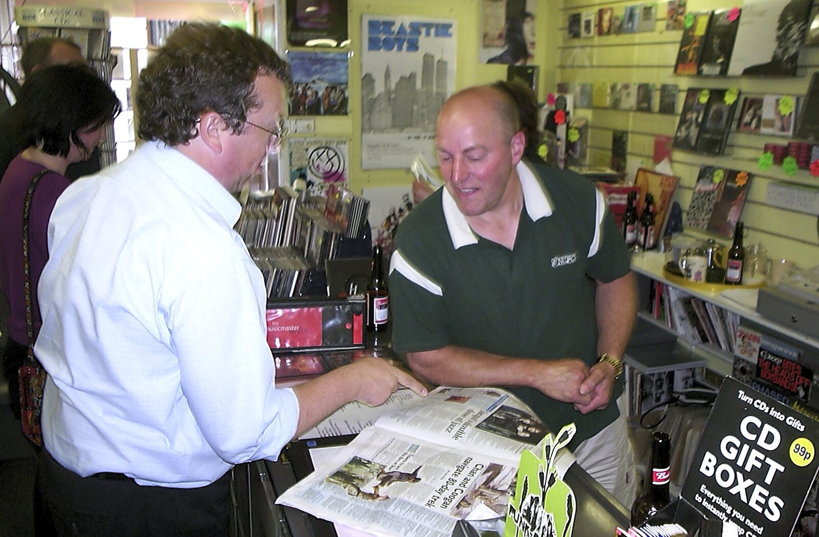 Wes chats to a customer from Longview play Revolution Records, Diss, Norfolk - 2nd July 2004