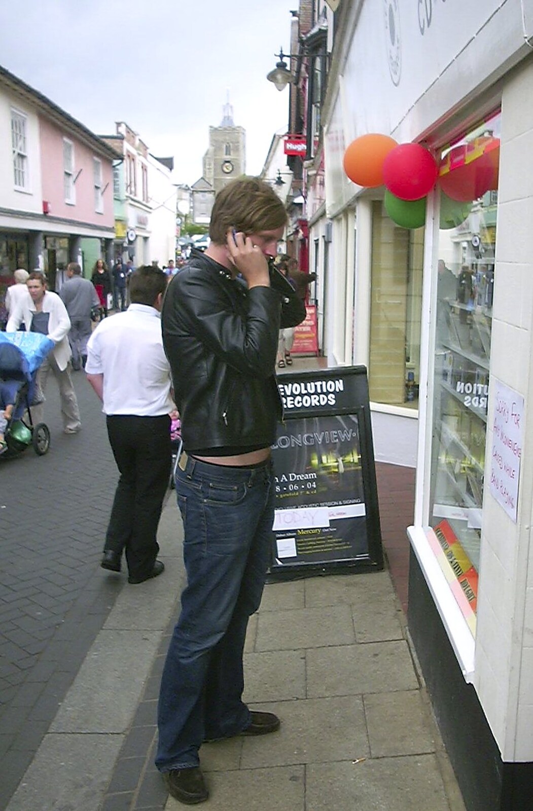 On the phone outside Revolution Records from Longview play Revolution Records, Diss, Norfolk - 2nd July 2004