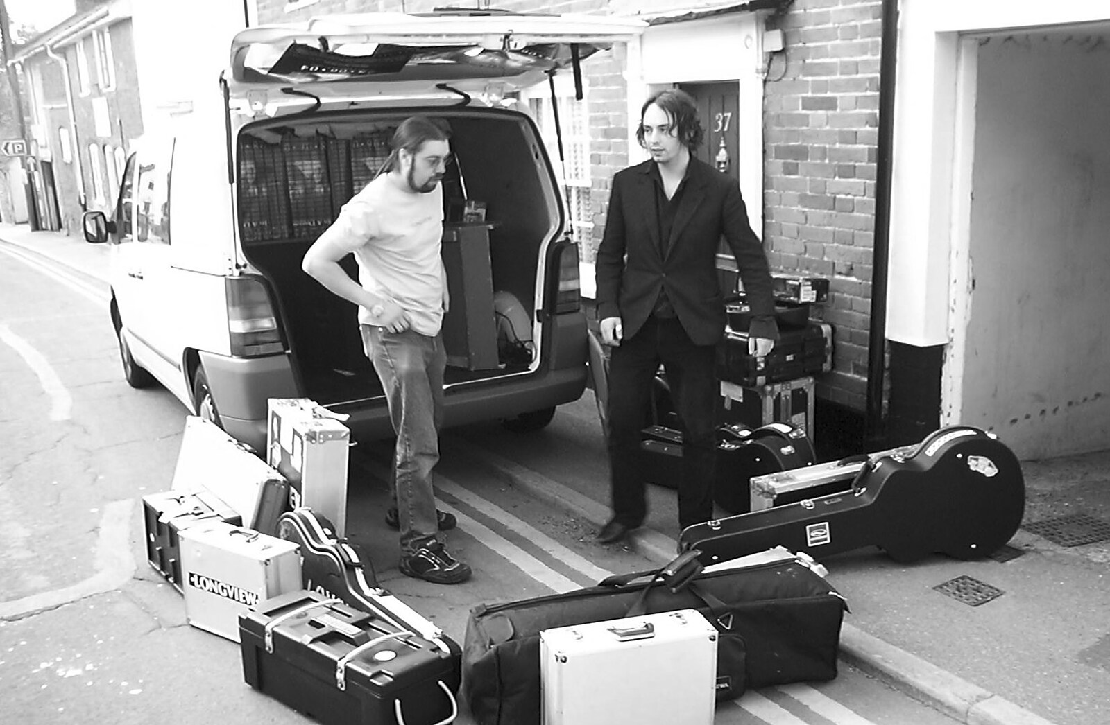 Loading up the gear into a van on Chapel Street from Longview play Revolution Records, Diss, Norfolk - 2nd July 2004