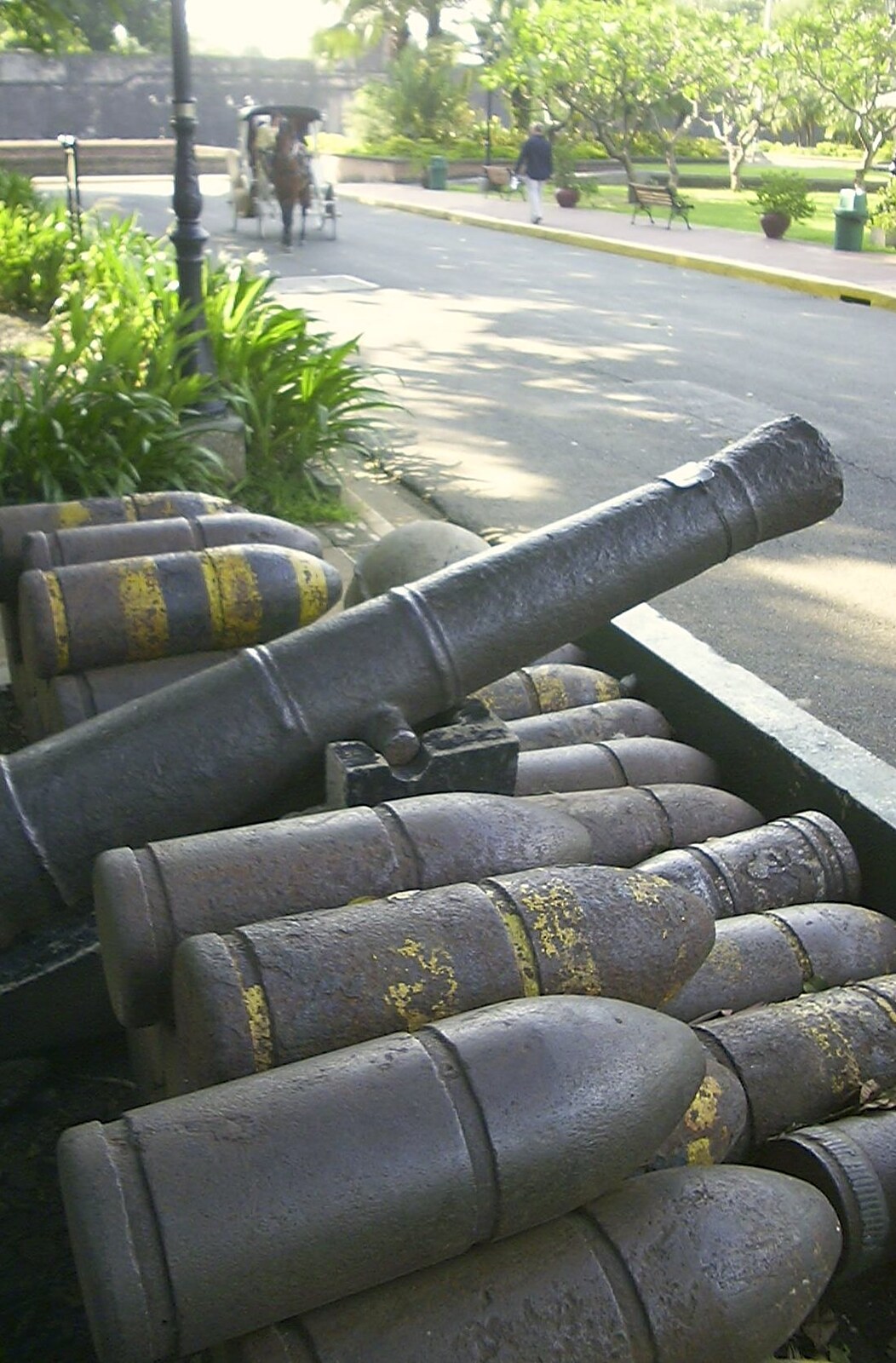 A cannon and some WWII shells from A Postcard From Manila: a Working Trip, Philippines - 9th July 2004