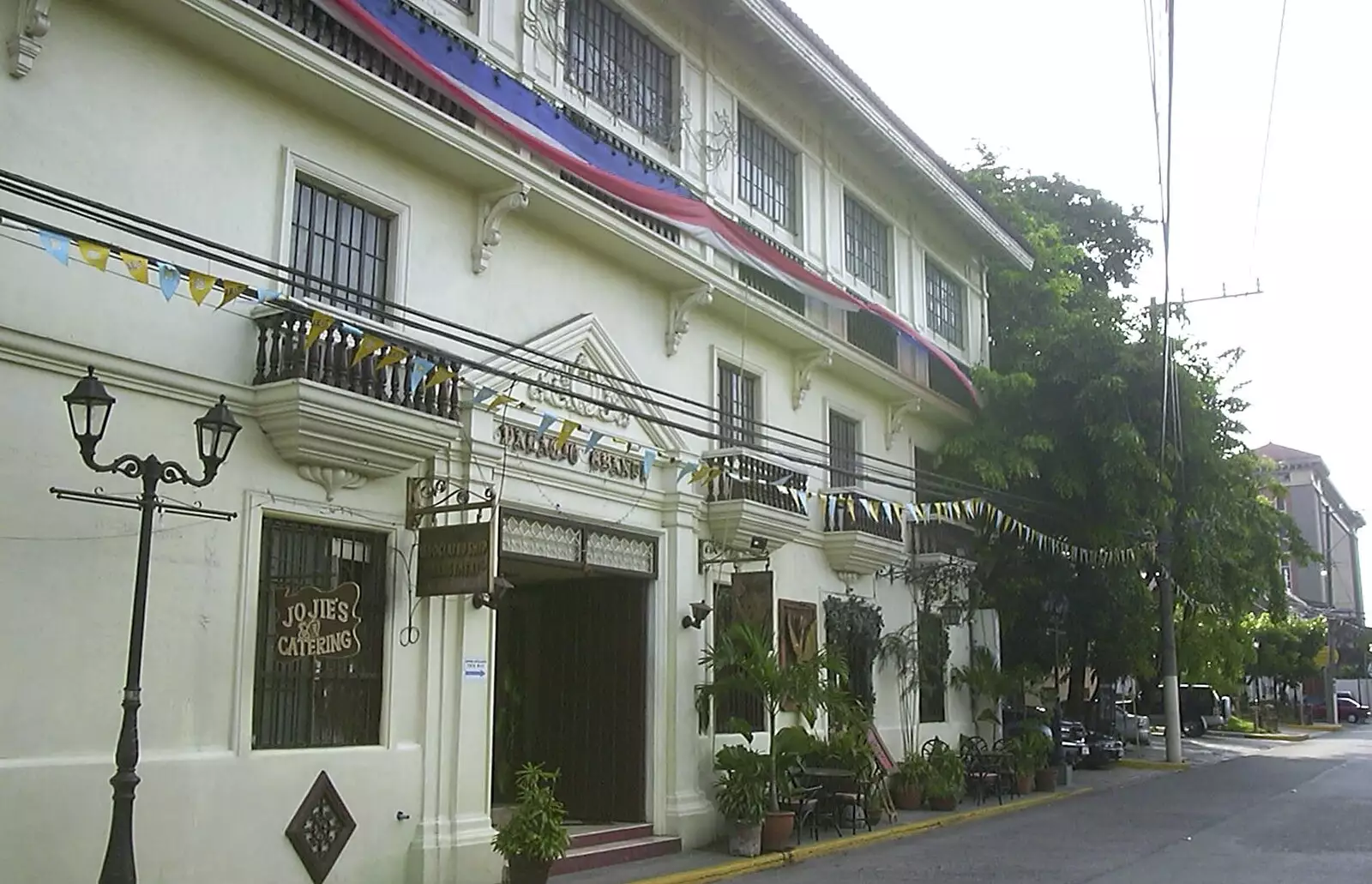 A building wrapped in bunting, from A Postcard From Manila: a Working Trip, Philippines - 9th July 2004