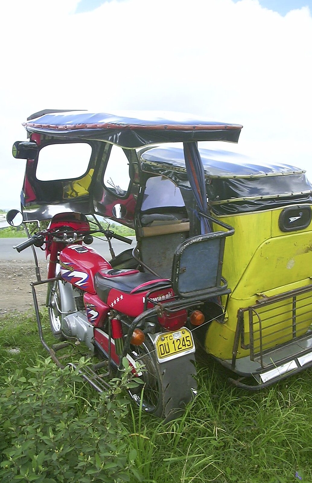 An abandoned-looking motorbike and sidecar from A Postcard From Manila: a Working Trip, Philippines - 9th July 2004