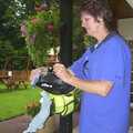 The BSCC Annual Sponsored Bike Ride, The Cottage, Thorpe St. Andrew, Norwich  - 18th July 2004, Jill wipes her helmet down