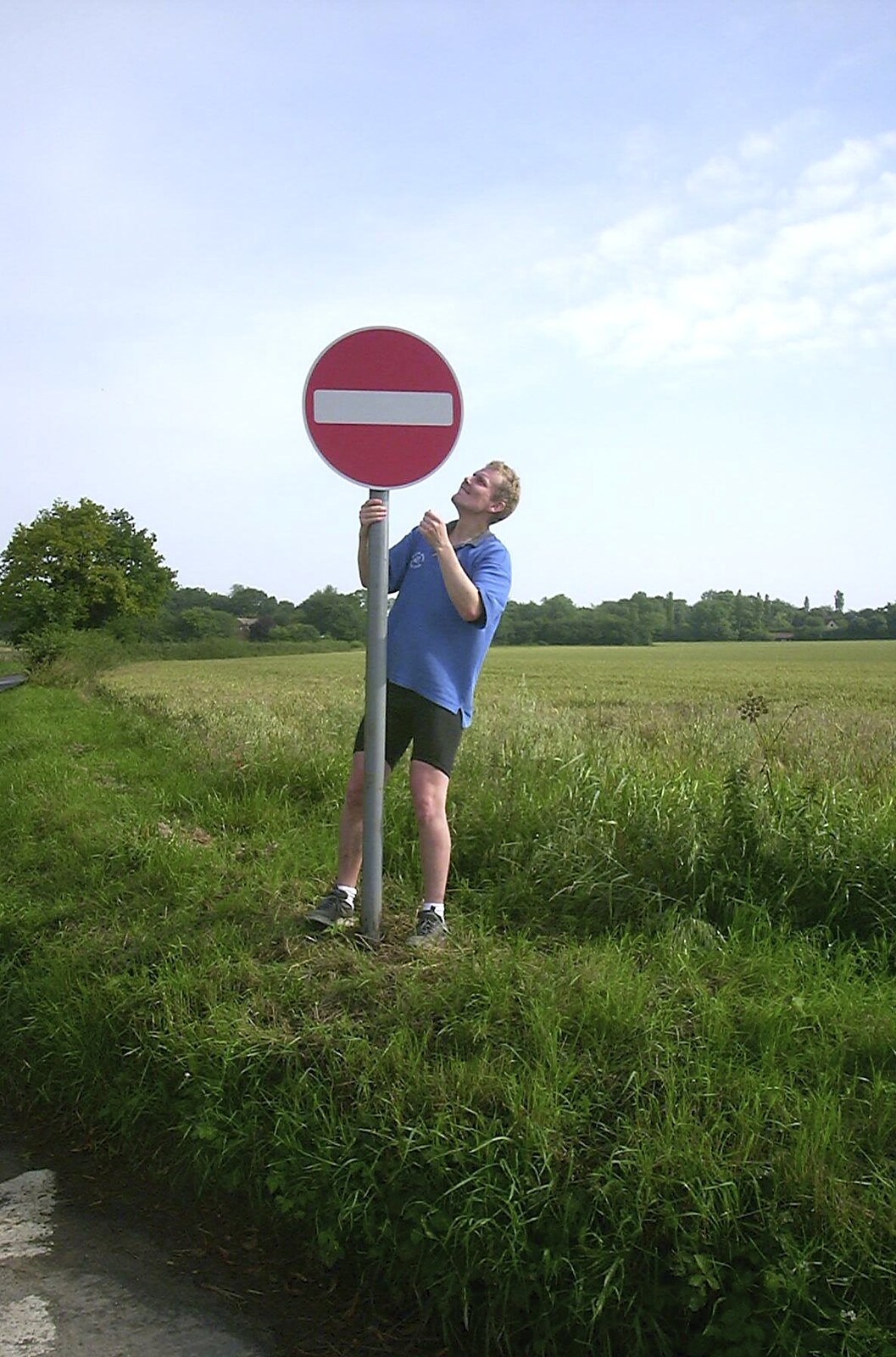 Bill tries to reverse the no-entry sign from The BSCC Annual Sponsored Bike Ride, The Cottage, Thorpe St. Andrew, Norwich  - 18th July 2004