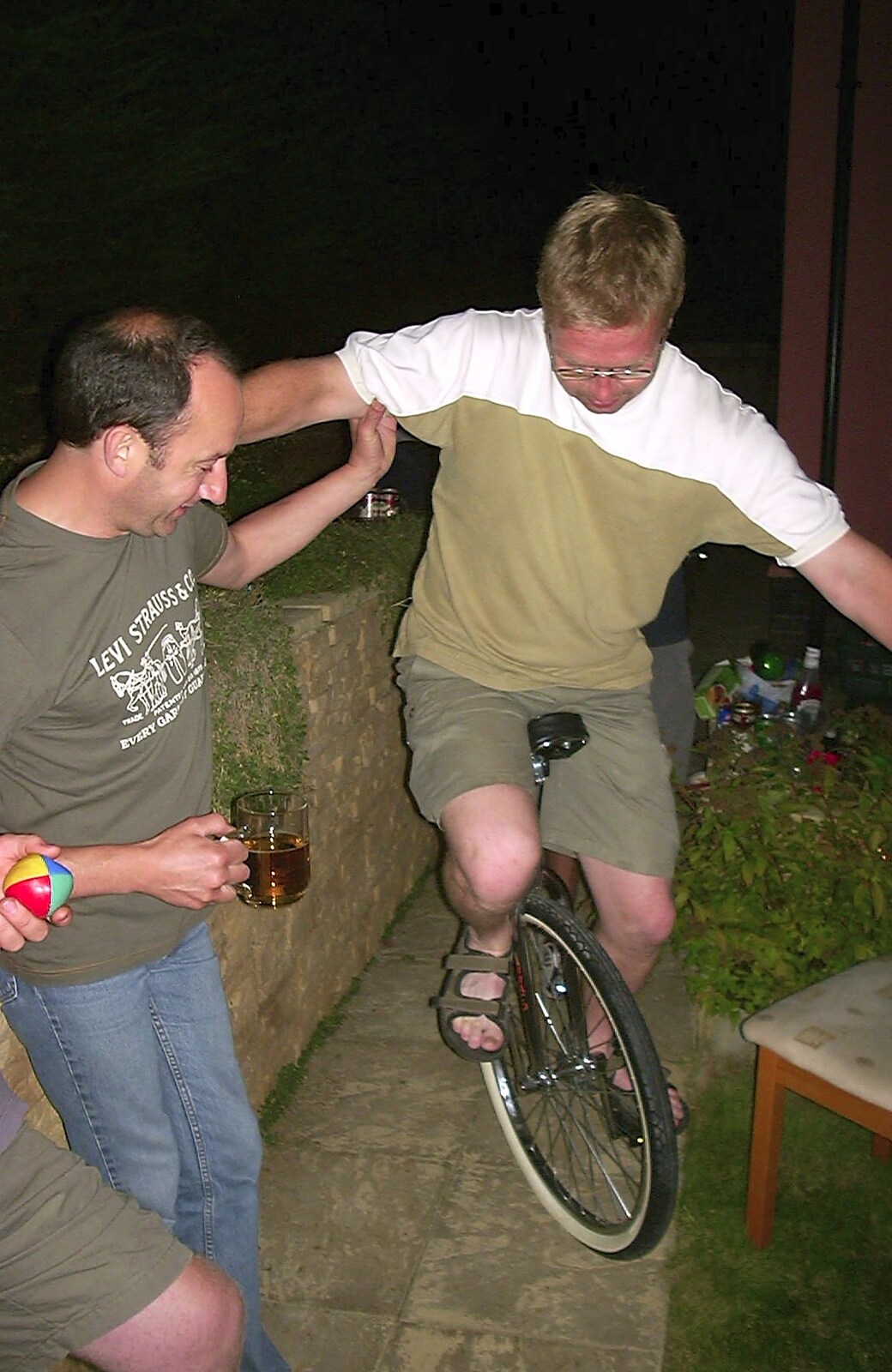 The BSCC in Debenham, and Bill's Housewarming Barbie, Yaxley, Suffolk - 31st July 2004: Marc tries out a unicycle