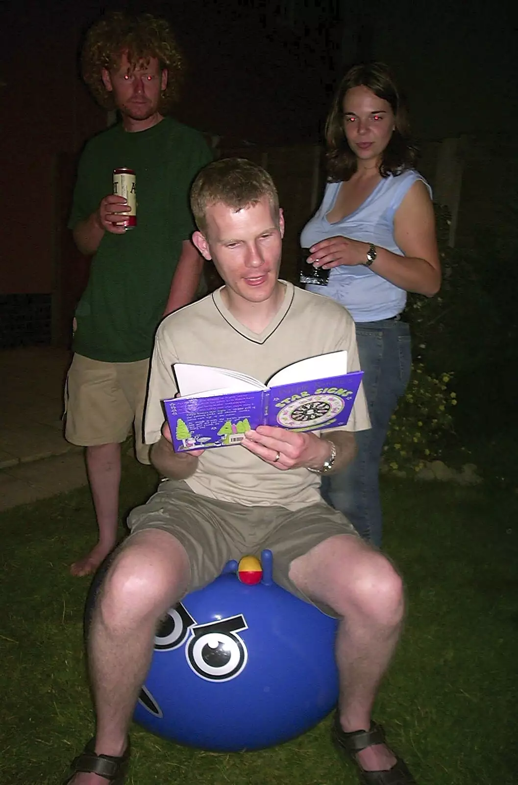 Andy reads horoscopes while space-hopping, from The BSCC in Debenham, and Bill's Housewarming Barbie, Yaxley, Suffolk - 31st July 2004