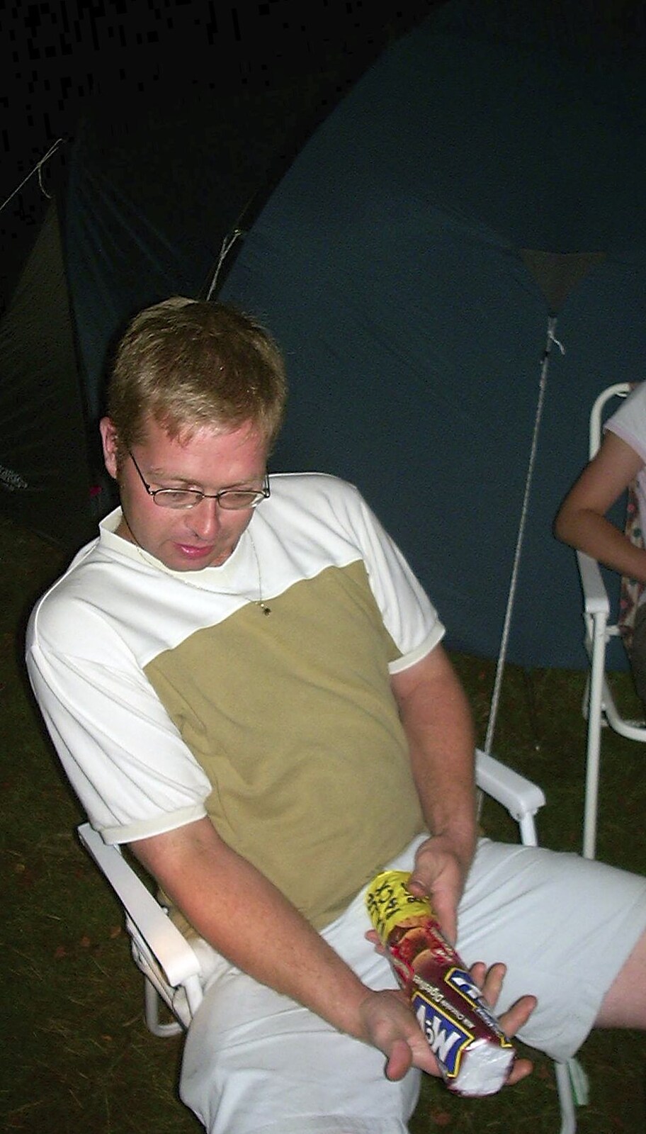 A BSCC Splinter Group Camping Trip, Shottisham, Suffolk - 13th August 2004: Marc flops out a massive packet... of biscuits
