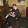 Nosher plays a bit of piano, A BSCC Splinter Group Camping Trip, Shottisham, Suffolk - 13th August 2004
