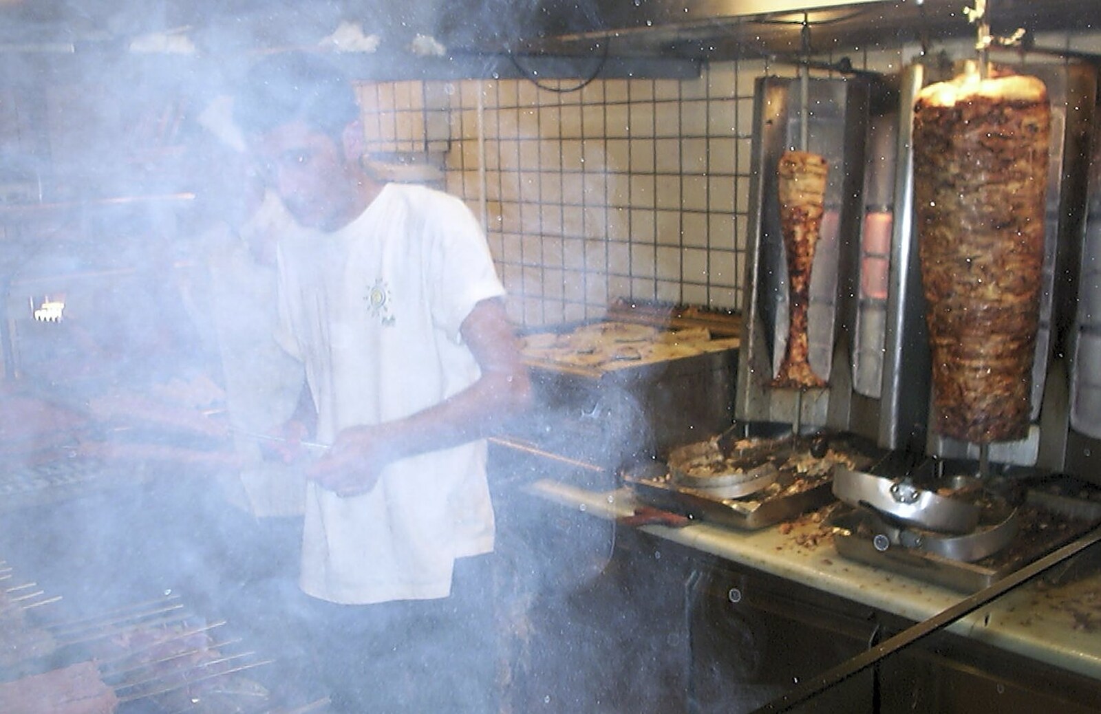 A Postcard From Athens: A Day Trip to the Olympics, Greece - 19th August 2004: The smoke is intense in the kebab shop