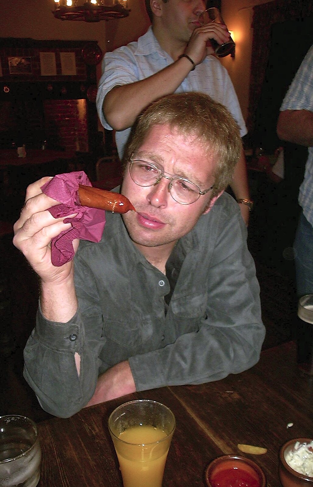 Marc worries about a very penile sausage from Paul's Stag Night, Brome, Scole and Bressingham - Friday 20th August 2004