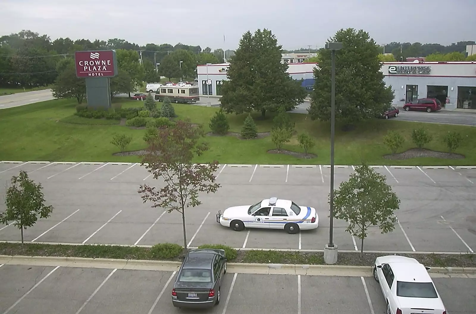 A state trooper scopes our hire car out, from A Trip to Libertyville, Illinois, USA - 31st August 2004