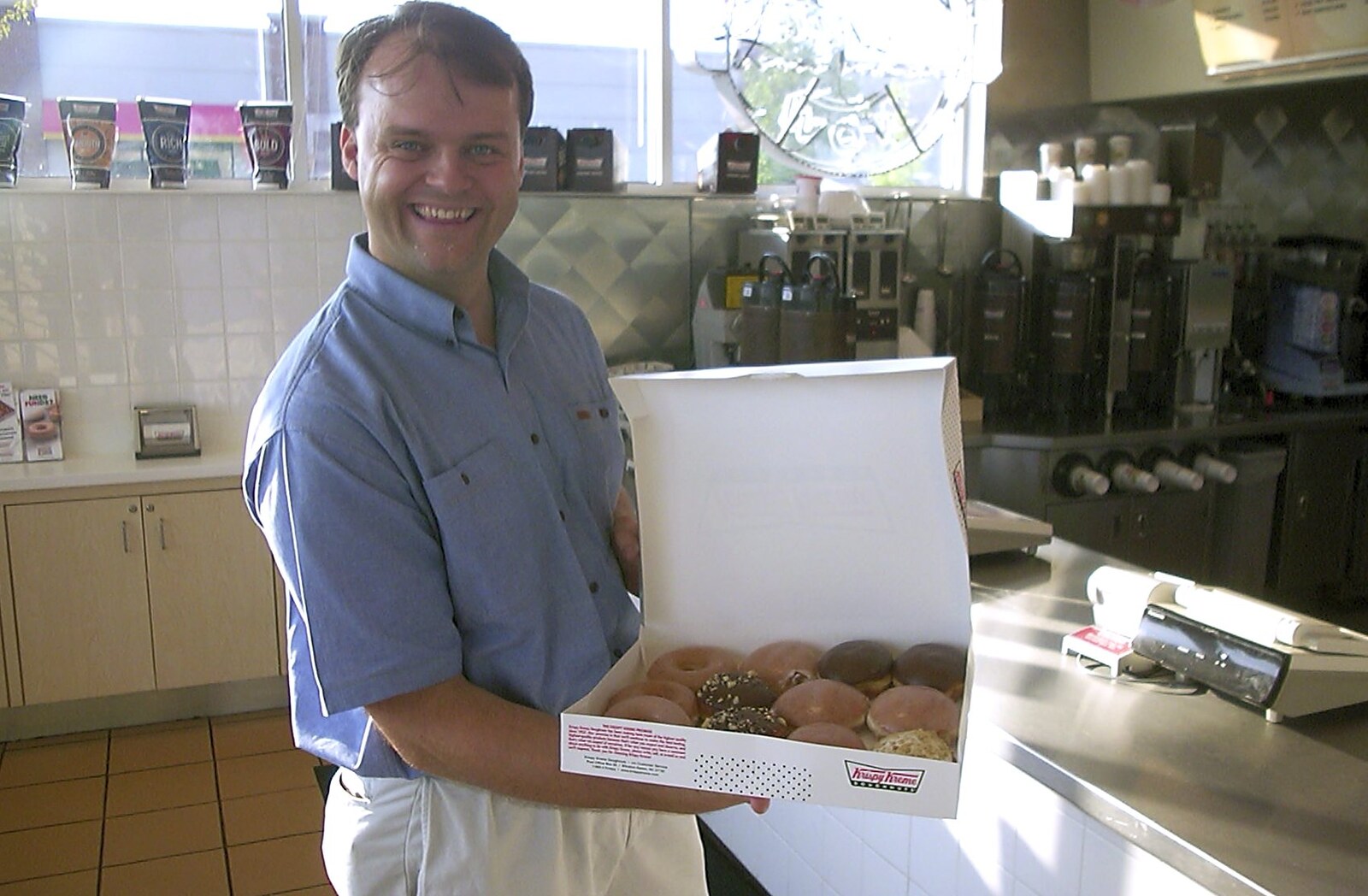 Nick shows off his prize: a 12-box of donuts from A Trip to Libertyville, Illinois, USA - 31st August 2004