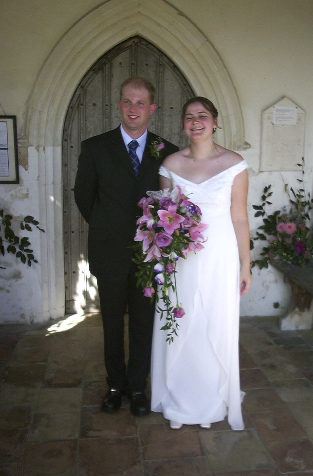Paul and Claire in the entrance to the church from Claire and Paul's Wedding and The BBs, Thrandeston and Brome, Suffolk - 4th September 2004