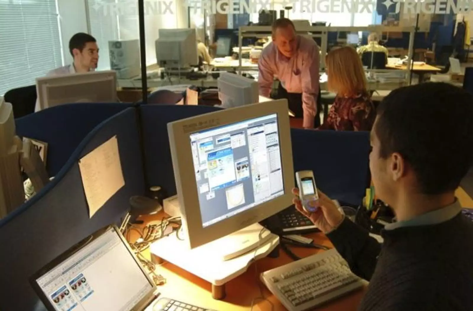 A publicity shot of the design team, from A 3G Lab/Trigenix Miscellany, Matrix House, Cambridge - 25th September 2004