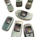 An array of mostly-Nokia phones with a Trig on, A 3G Lab/Trigenix Miscellany, Matrix House, Cambridge - 25th September 2004