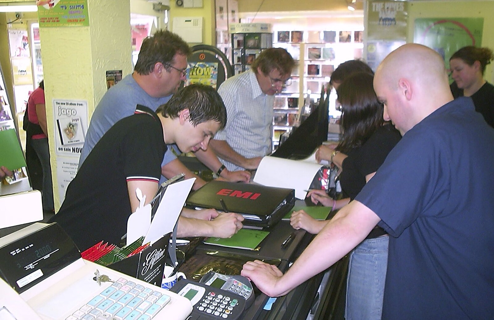 More signing, as the EMI rep looks on from Mark Joseph at Revs, and the BSCC at Hoxne and Wortham - 30th September 2004