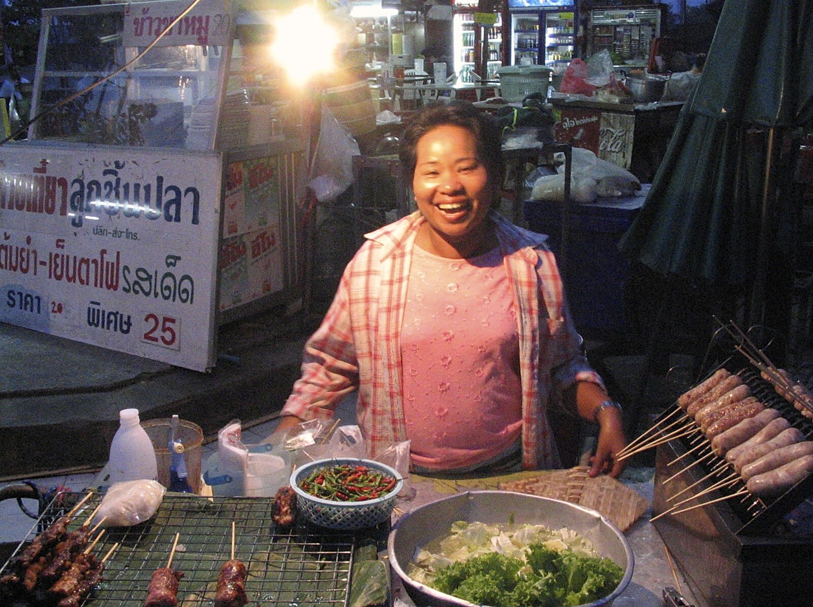 A cheerful woman sells meat on a stick from A Working Trip to Bangkok, Thailand - 2nd October 2004