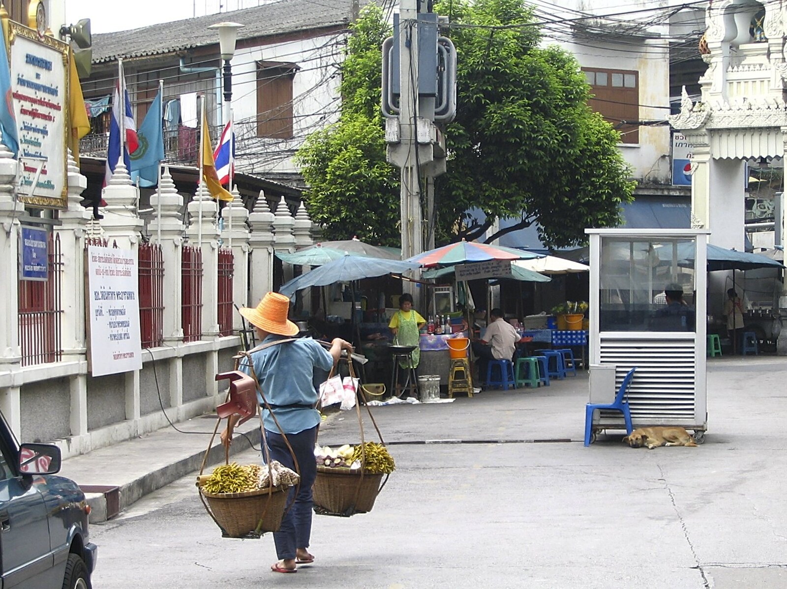 A woman with baskets of fruit roams around from A Working Trip to Bangkok, Thailand - 2nd October 2004