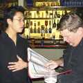 The karaoke list is inspected, Sydney, New South Wales, Australia - 10th October 2004