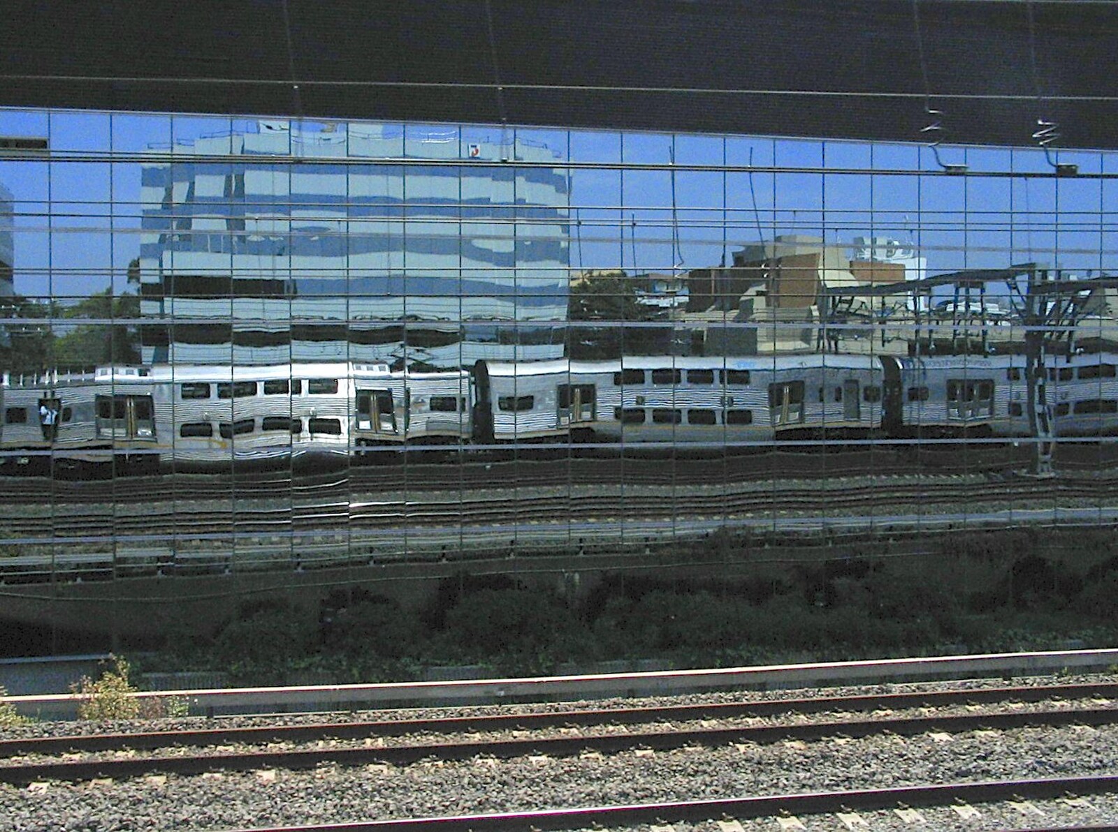 Nosher's train reflected in a building from Sydney, New South Wales, Australia - 10th October 2004