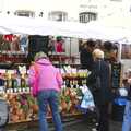 Somebody peers at fruit juices, A French Market, Blues and Curry, Diss, Scole and Brome - 17th October 2004
