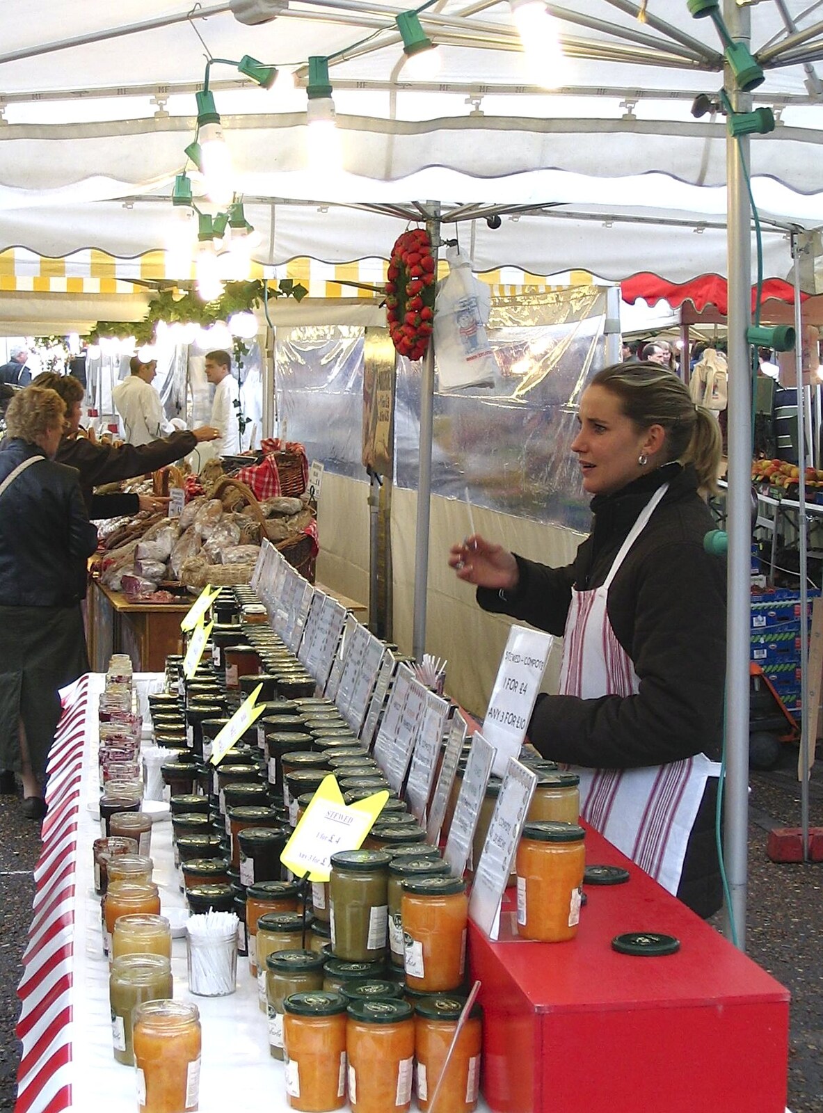 A woman sells preserves from A French Market, Blues and Curry, Diss, Scole and Brome - 17th October 2004