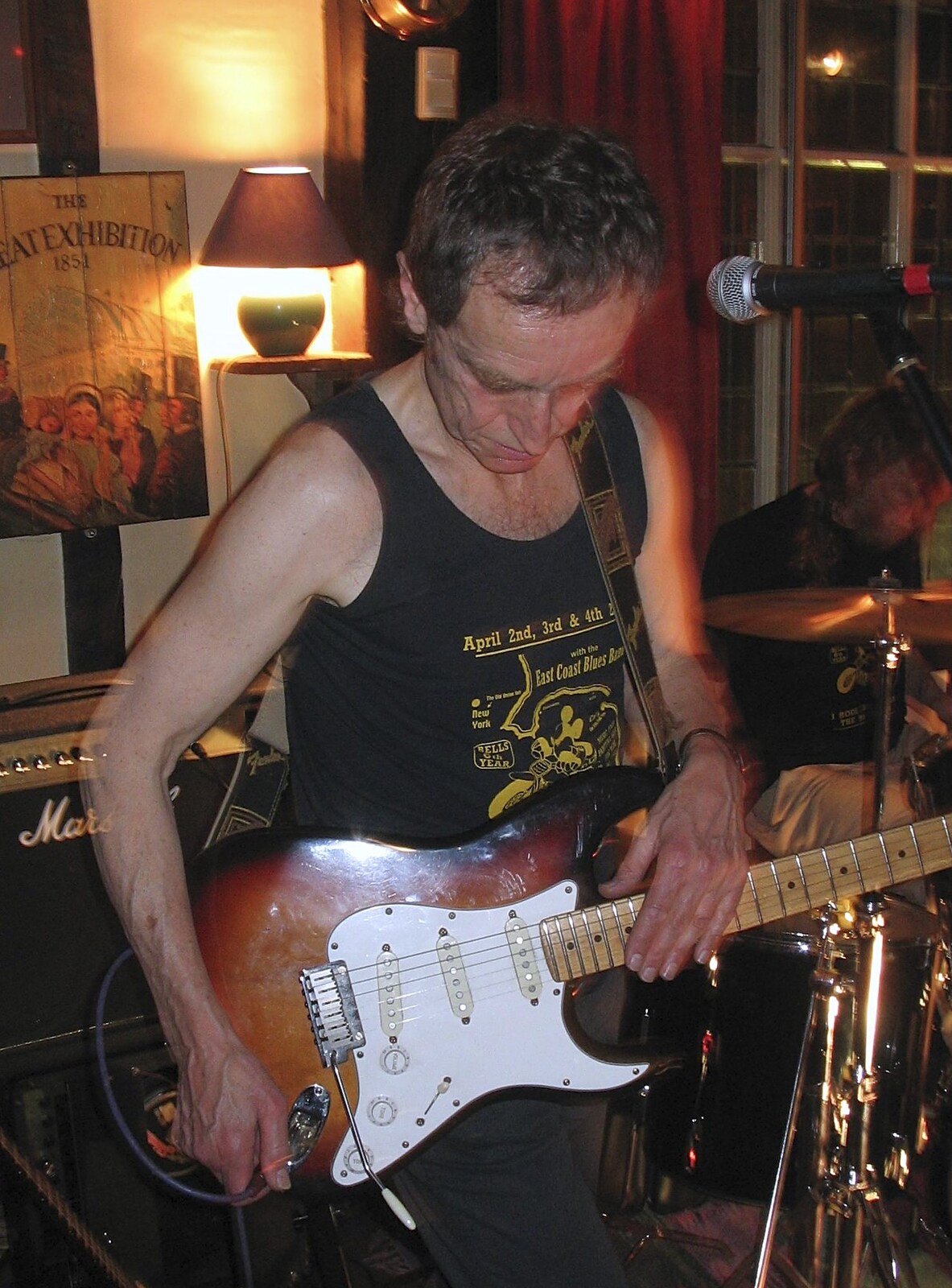 The guitarist has a technical issue from A French Market, Blues and Curry, Diss, Scole and Brome - 17th October 2004