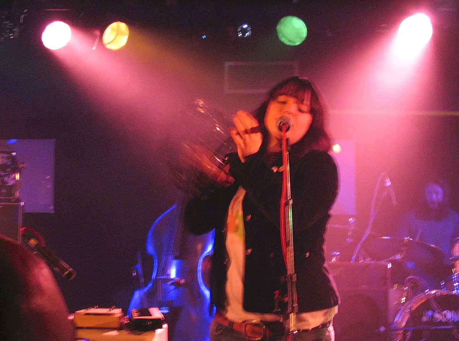 Michele Stodart thrashes a tambourine around, from Embrace and Ed Harcourt Live in Norwich, Norfolk - 17th November 2004