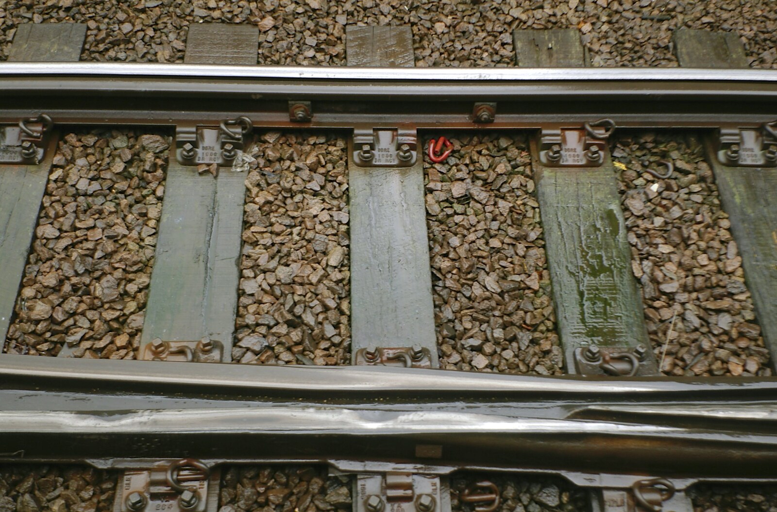 Wet wooden sleepers on a set of point from London in the Rain - 18th November 2004