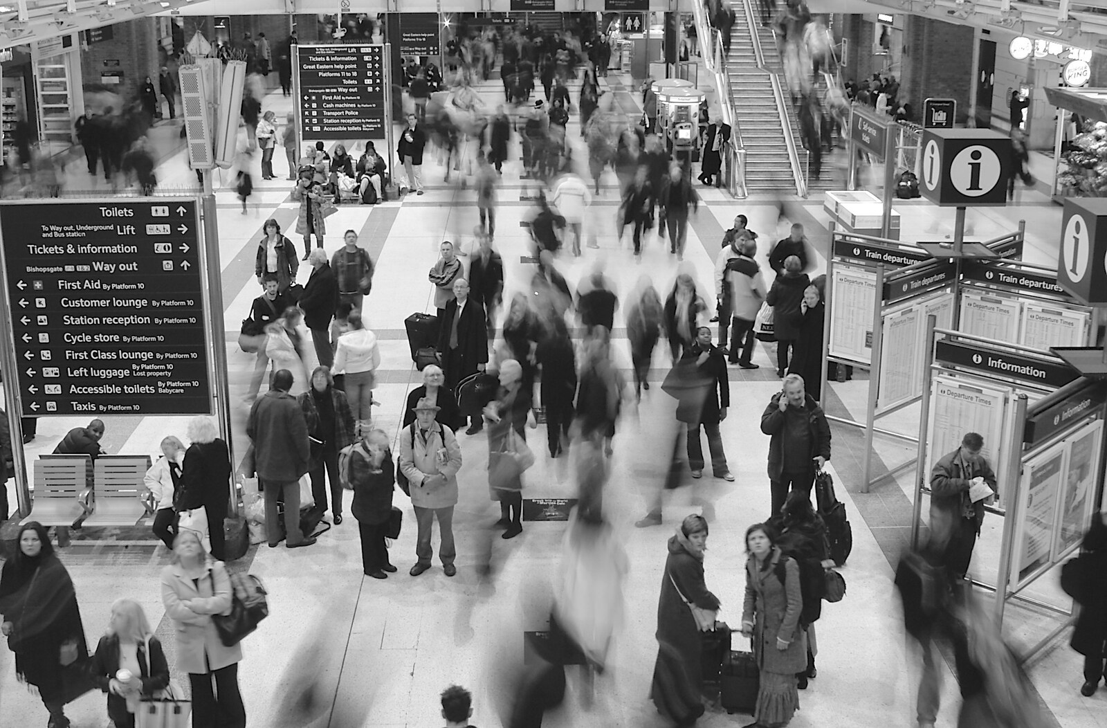 Some are a blur, whilst others stand and wait from London in the Rain - 18th November 2004