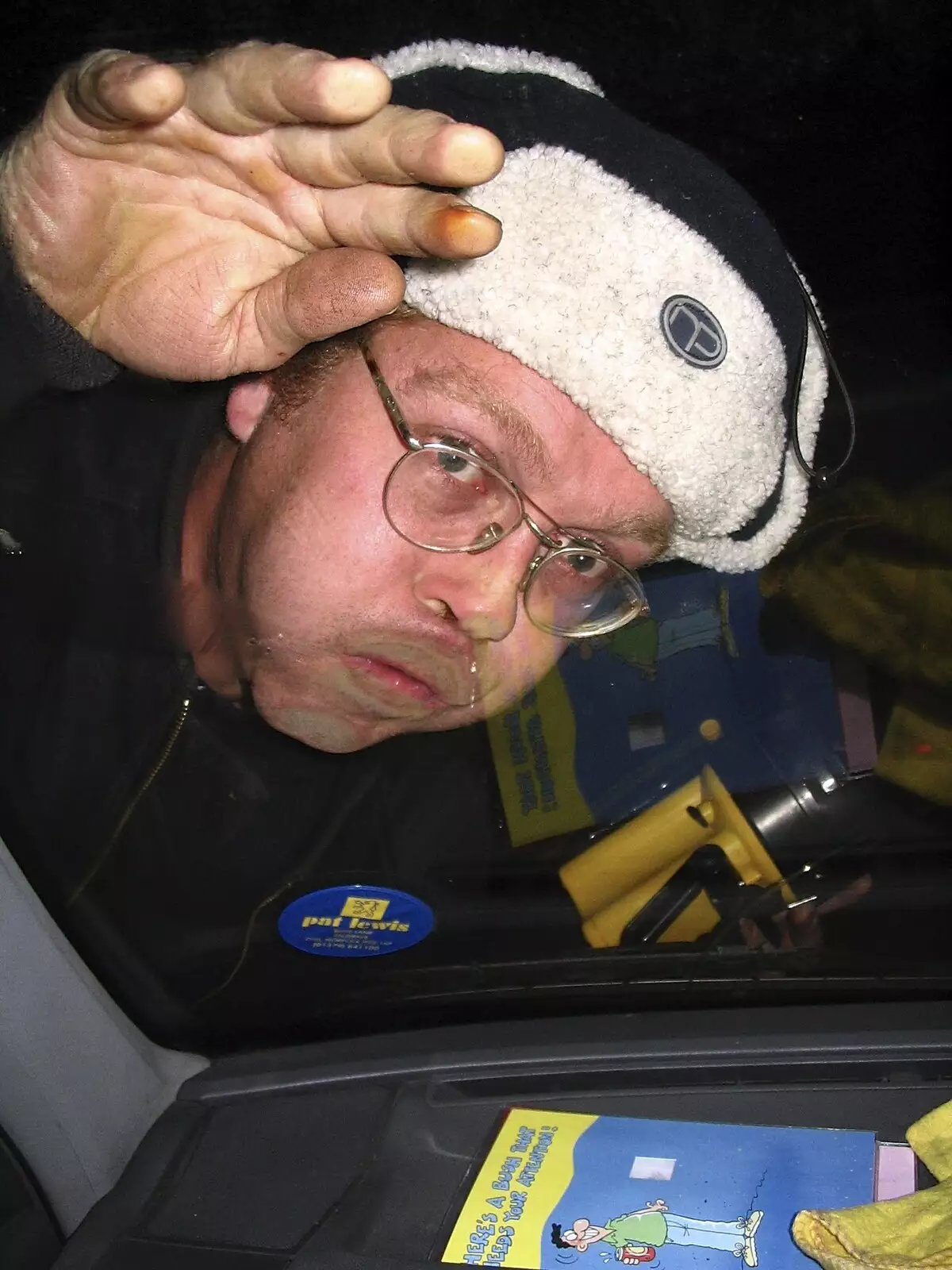 Marc squashes his face to the car window, from The Hoxne Swan Beer Festival, Hoxne, Suffolk - 20th November 2004