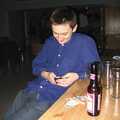 Andrew does some texting too, A CISU Blues Festival at the SCC Social Club, Ipswich, Suffolk - 27th November 2004