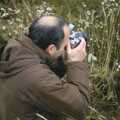 DH takes a photo in a marsh, A Trip to East Lane, Bawdsey, Suffolk - 28th November 2004
