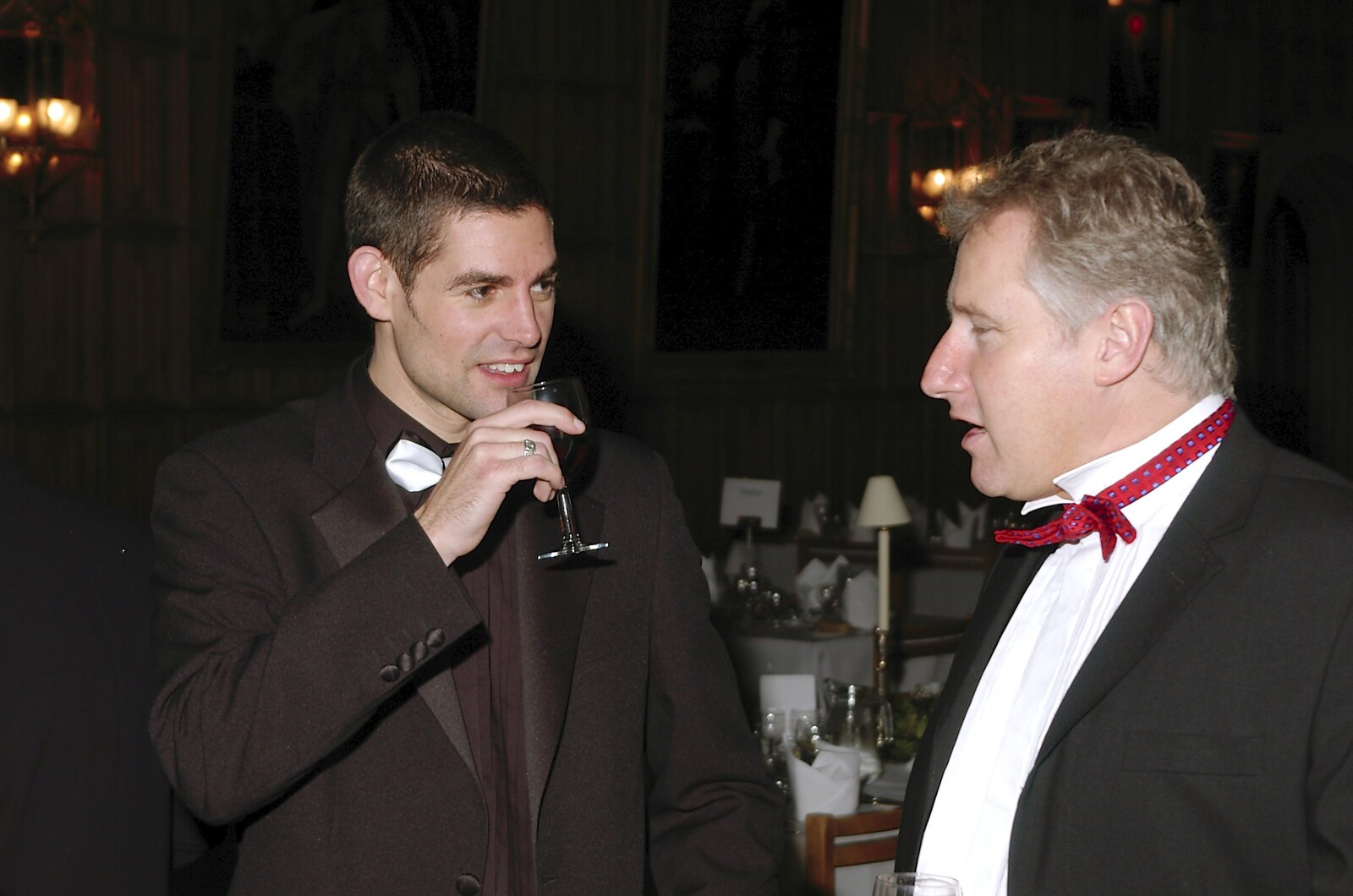 Rob Hamblen chats to someone from Qualcomm Cambridge's Christmas Do, King's College, Cambridge - 22nd December 2004