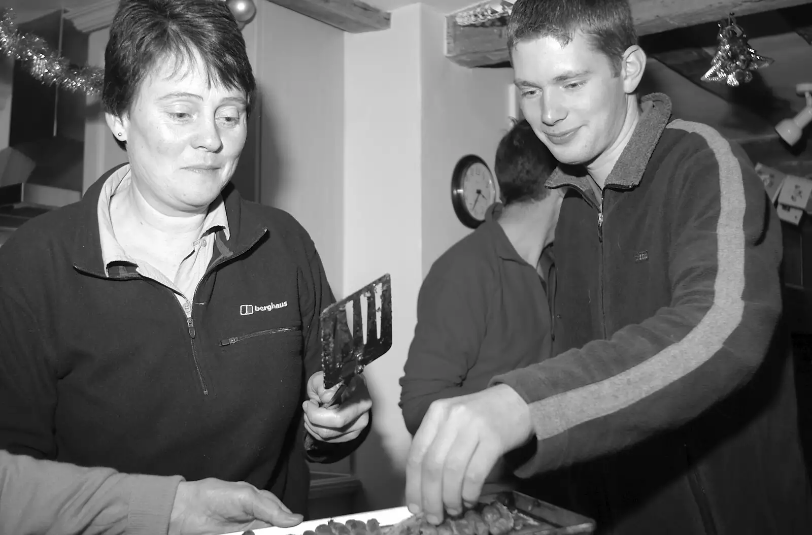 The Boy Phil grabs some food, from Boxing Day Rambles, Hoxne and Oakley, Suffolk - 26th December 2004