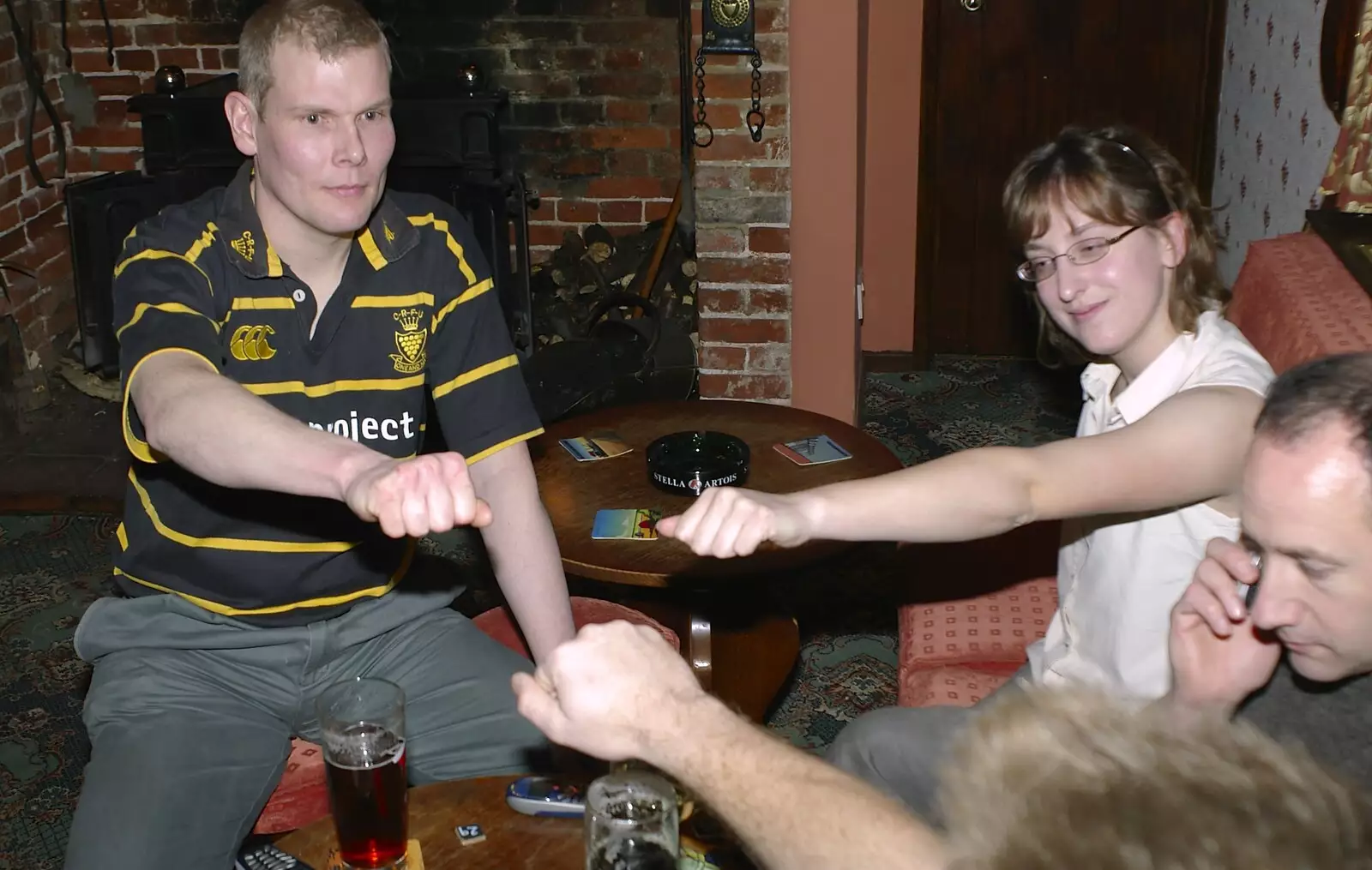 Some sort of rock/paper/scissors, from New Year's Eve at The Swan Inn, Brome, Suffolk - 31st December 2004