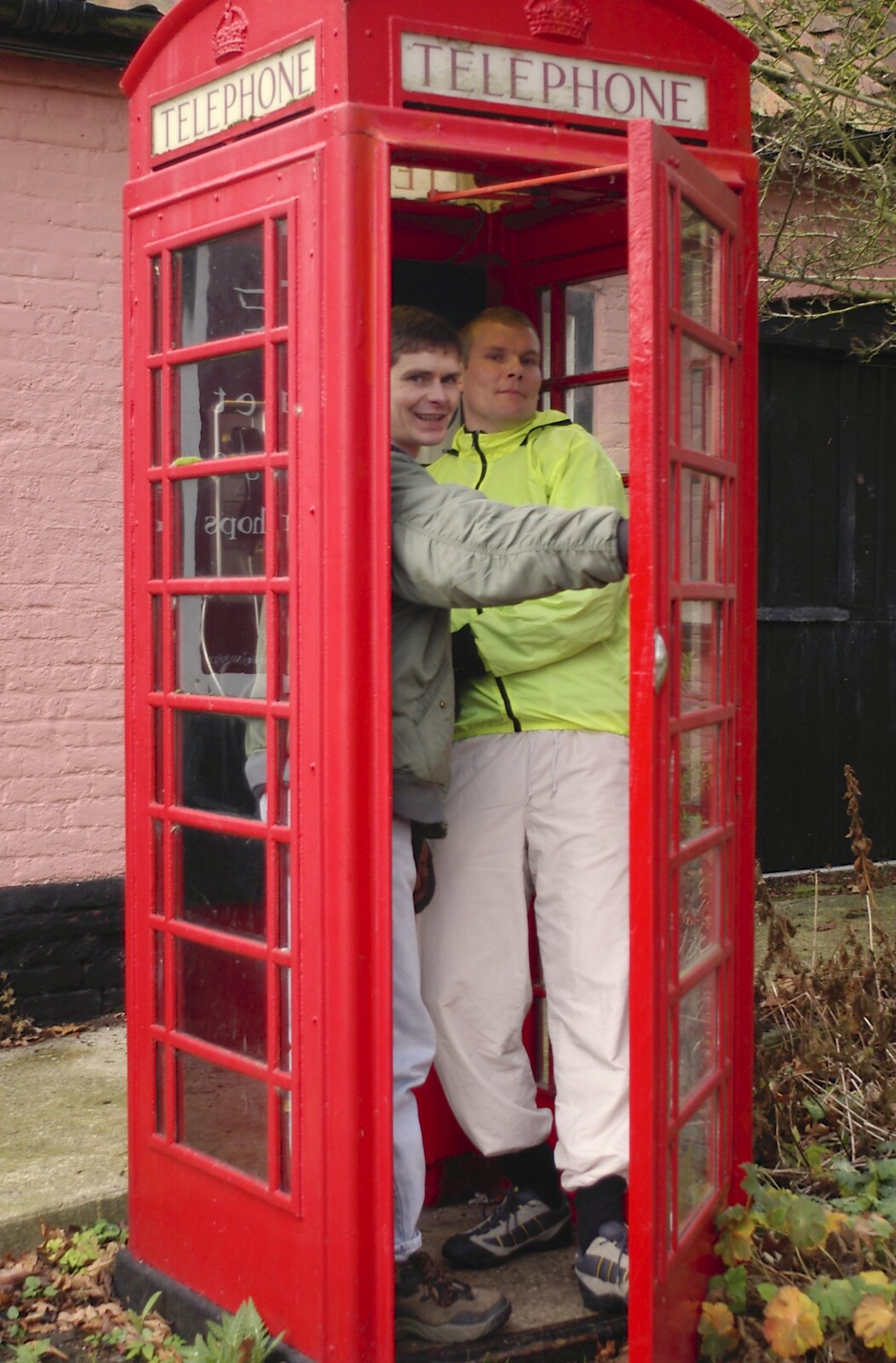 Ninja M and Bill in a K6 phone box in Thornham from New Year's Eve at The Swan Inn, Brome, Suffolk - 31st December 2004
