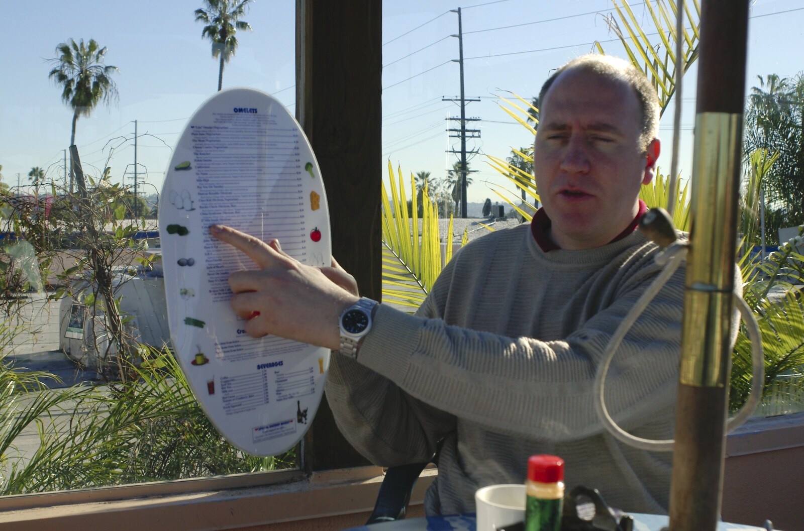 A Trip to San Diego, California, USA - 11th January 2005: Russell points to something extreme on the menu
