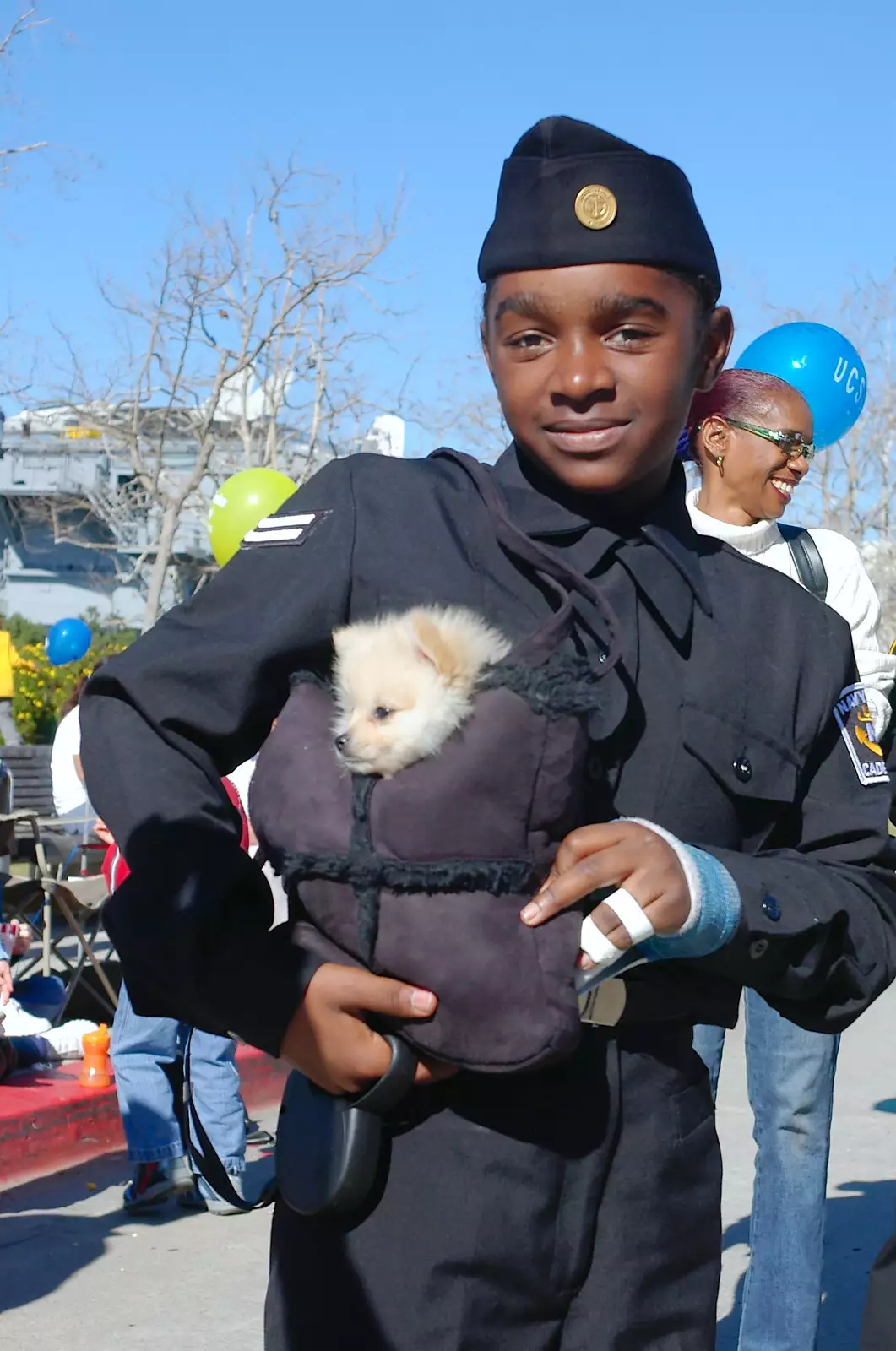 A girl has a tiny dog in a bag, from Martin Luther King Day and Gomez at the Belly Up, San Diego, California, US - 15th January 2005