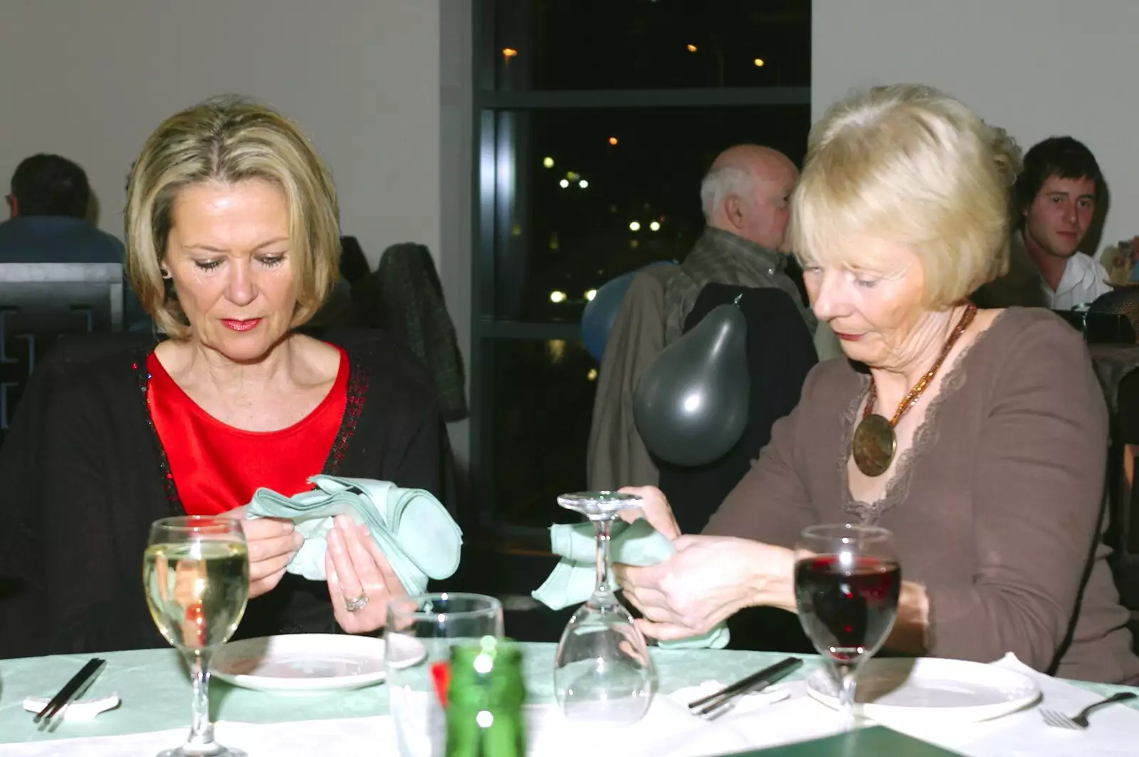 Folding up napkins in Eastern Court, from The Old Man's 70th Birthday, Pontefract, West Yorkshire - 29th January 2005