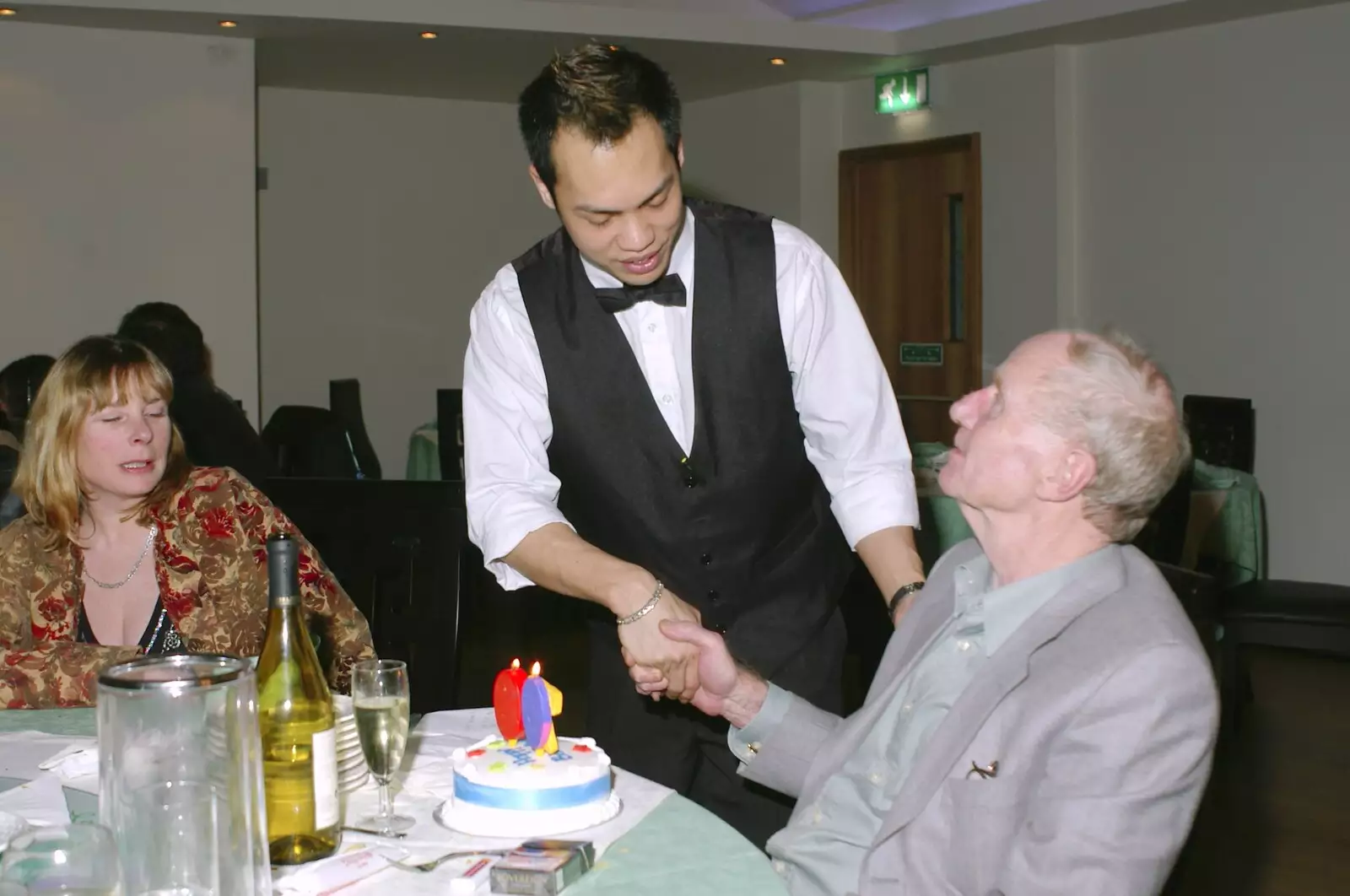 The old man gets a cake and a handshake, from The Old Man's 70th Birthday, Pontefract, West Yorkshire - 29th January 2005