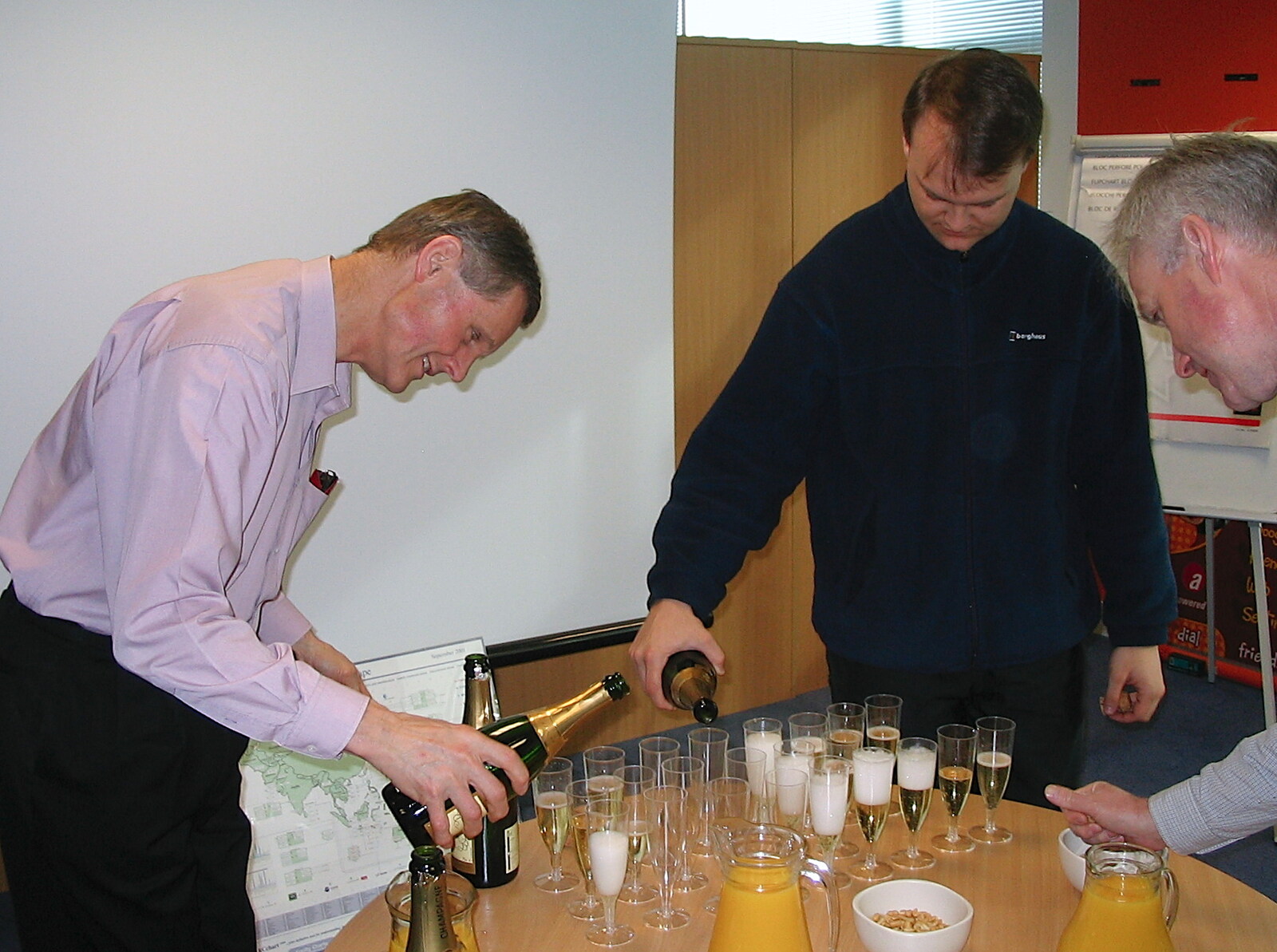 At the new Qualcomm Cambridge, Champagne is served from A Swan Car Crash and the End of Trigenix, Brome and Cambridge - 31st January 2005