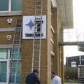 2005 Ladders are put up to remove the old sign