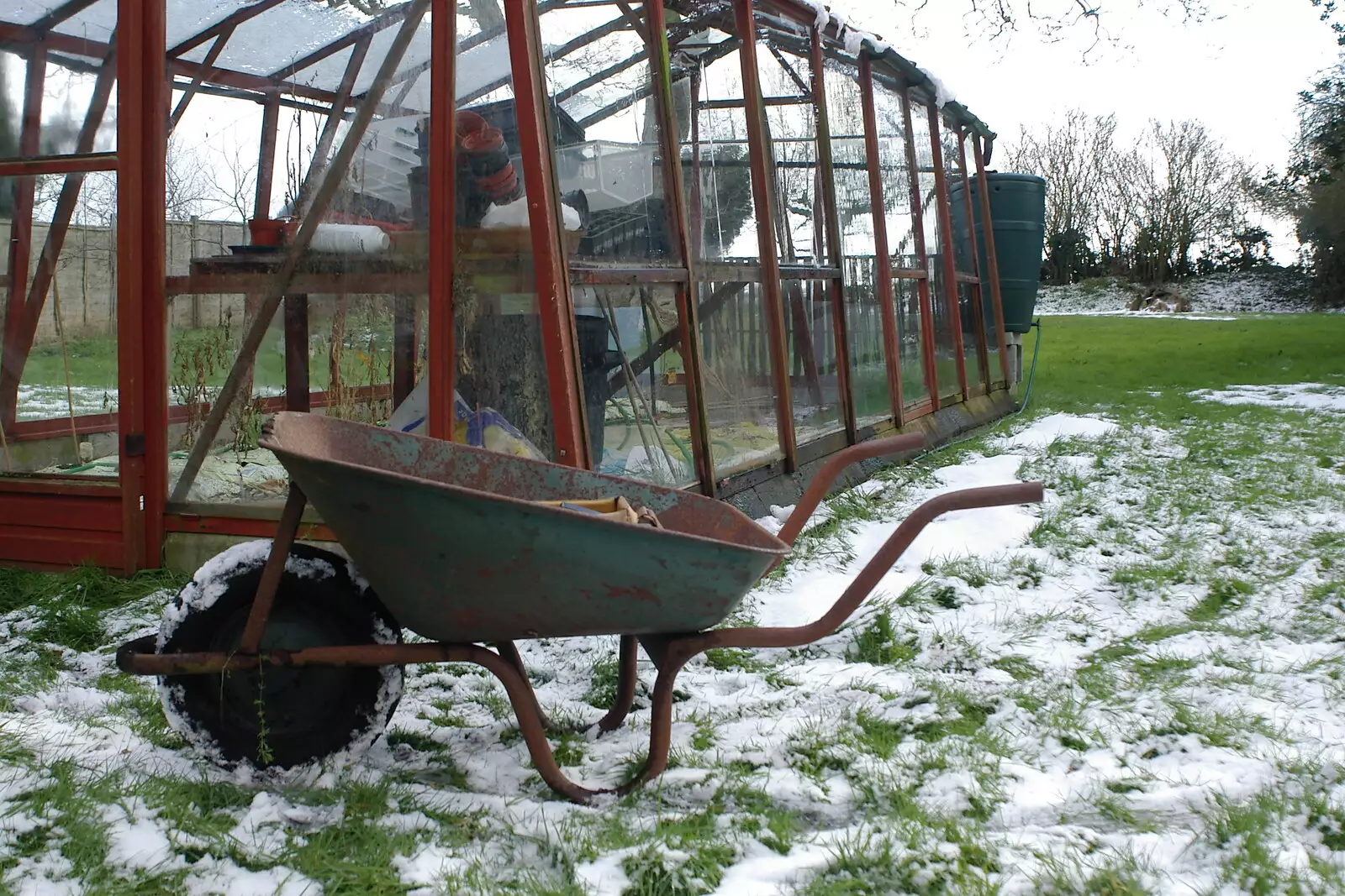 A wheelbarrow by the greenhouse, from Fiddler on the Roof and a Railway Inn Quiz, Gislingham and Mellis, Suffolk - 17th February 2005