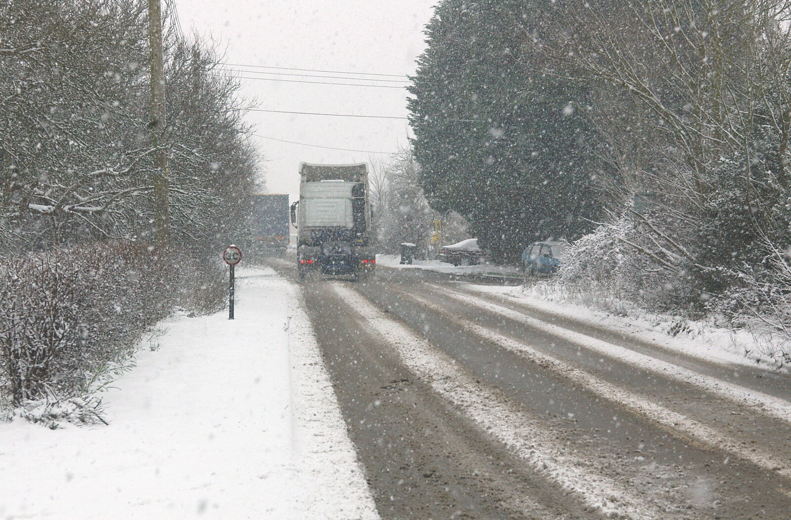 A heavy tractor unit negotiates the snow from Wendy Leaves "The Lab" and a Snow Day, Cambridge and Brome - 25th February 2005