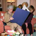 2005 Grandmother looks at an oversized card