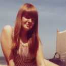 Mother on the beach in the 60s