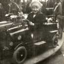 Margaret, aged around 6, on a fairground ride, c. 1930, Nosher's Family History - 1880-1955